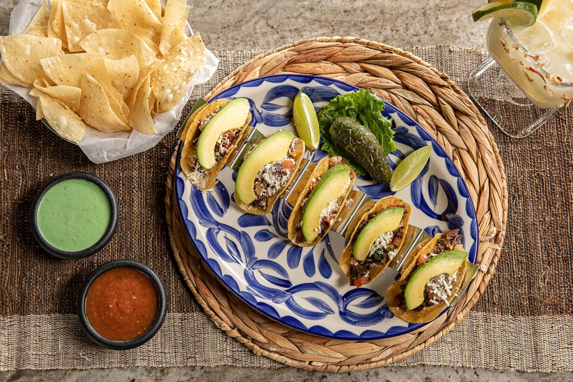 Iguana Joe’s street tacos with avocado, lime, chips and salsa